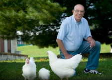  Paul Siegel with his high- and low-weight chickens (John McCormick, Virginia Tech)