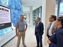 NIFA Director Dr. Manjit Misra talking with University of Missouri researchers. Image courtesy of University of Missouri.