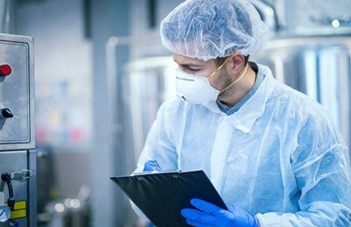 Scientist in lab. Image courtesy of Adobe Stock.