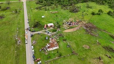 Stock photo of tornado damage in rural area. Image courtesy of Adobe Stock.