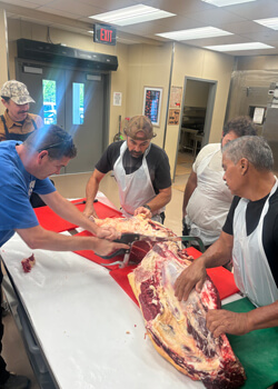 Hands on training is critical element of Hawaii Community College Butchery Class. Image courtesy of University of Hawaii.