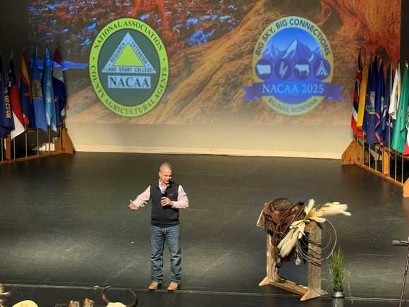 NIFA Director Dr. Jaye Hamby speaking at NACAA opening assembly. Photo courtesy of Jack Bazemore, Montana State University.