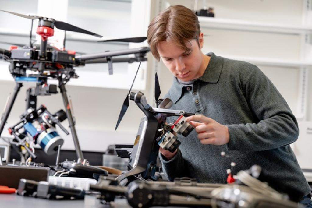 Student working in a drone lab. NIFA image.