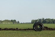 Flexible drainage pipe in field. Image courtesy of Adobe Stock.