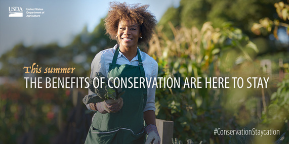 Woman farmer holding produce