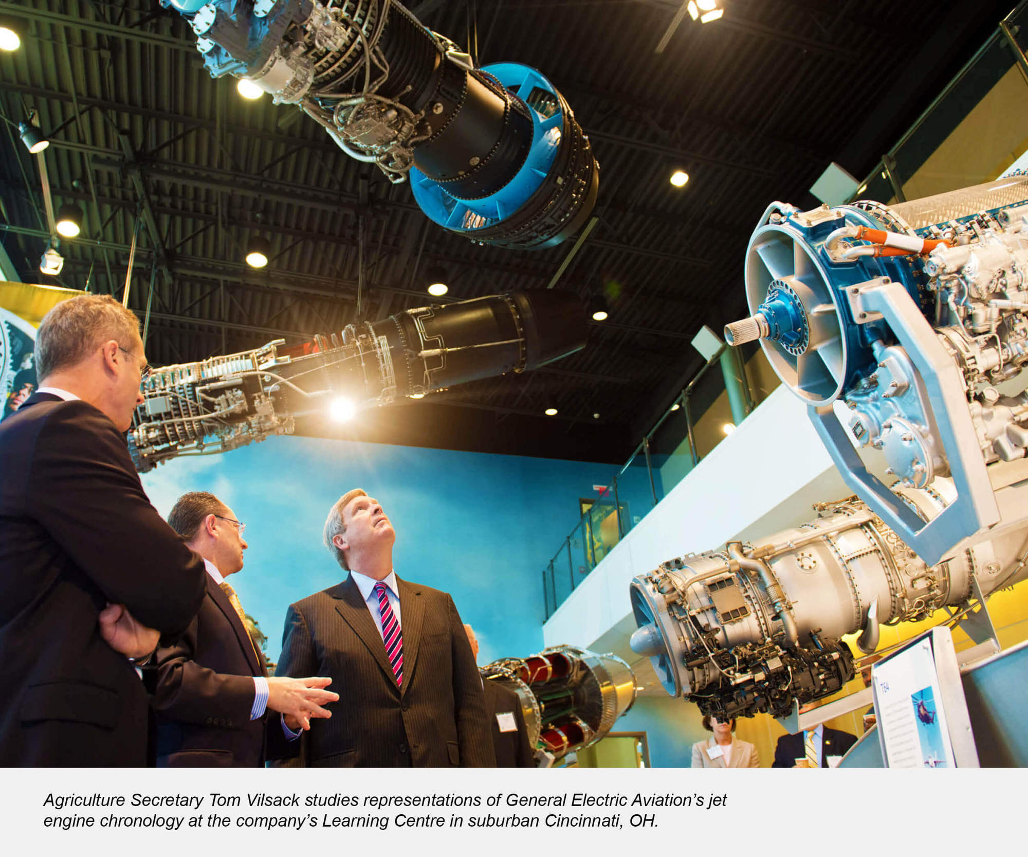 Agriculture Secretary Tom Vilsack studies representations of General Electric Aviation’s jet engine chronology at the company’s Learning Centre in sub