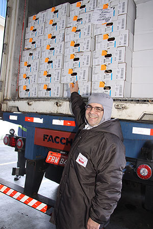 Consul General Ricardo Zuniga with the boxes of U.S. beef as they clear customs in Brazil, ready to hit the market.