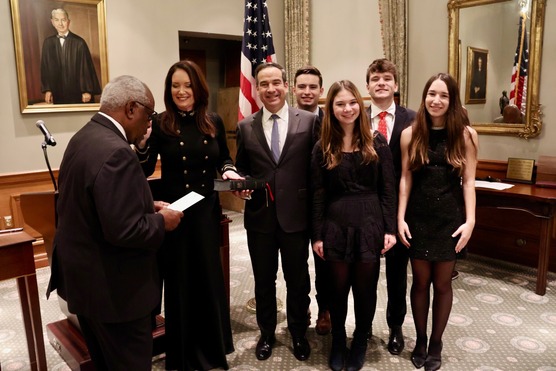 Secretary of Agriculture Brooke Rollins swearing in ceremony with family looking on