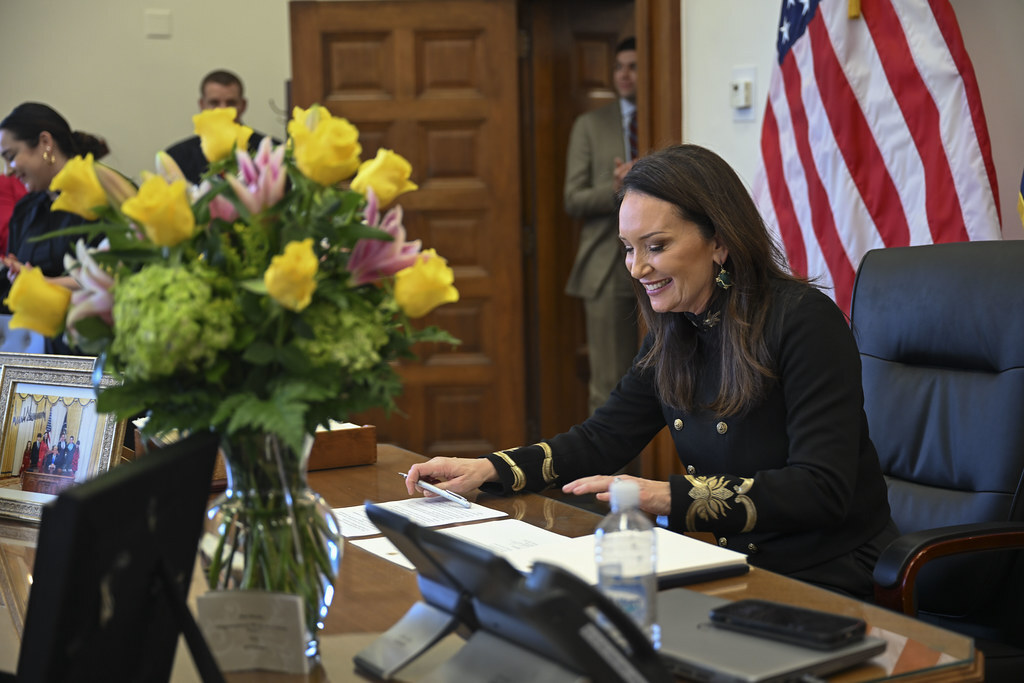 Secretary of Agriculture Brooke Rollins working at her desk