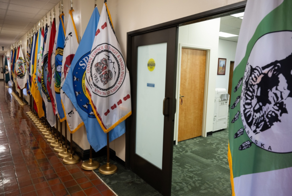 Tribal flags are lined up outside of the Office of Tribal Relations, USDA Headquarters, Washington D.C.