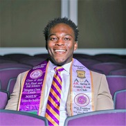Christopher Epps in graduation robes