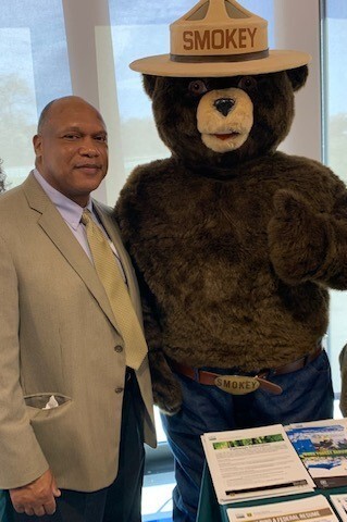 Larry Hartsfield with Smokey Bear