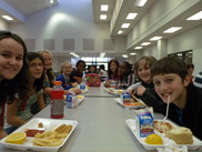 Elementary school students eating lunch in a cafeteria