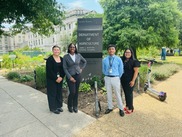 Group of interns standing outside by USDA monument