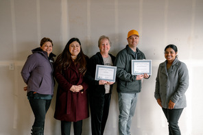 A family celebrates homeownership.