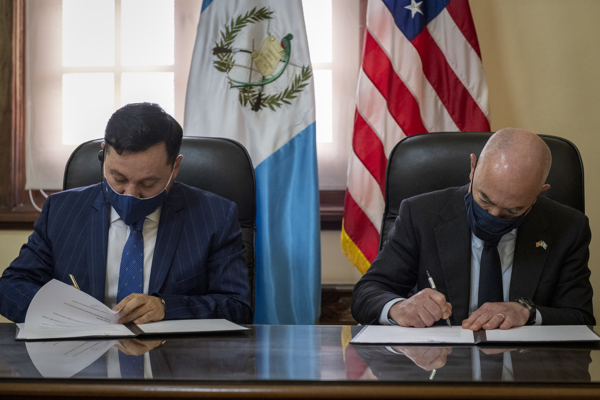 Secretary Mayorkas signs the Biometric Data Sharing Partnership Letter of Intent with Minister of Government Reyes  (DHS Photo by Zachary Hupp)