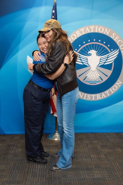 Secretary Noem with TSA agents at Boston Logan International Airport