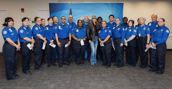 Secretary Noem with TSA agents at Boston Logan International Airport