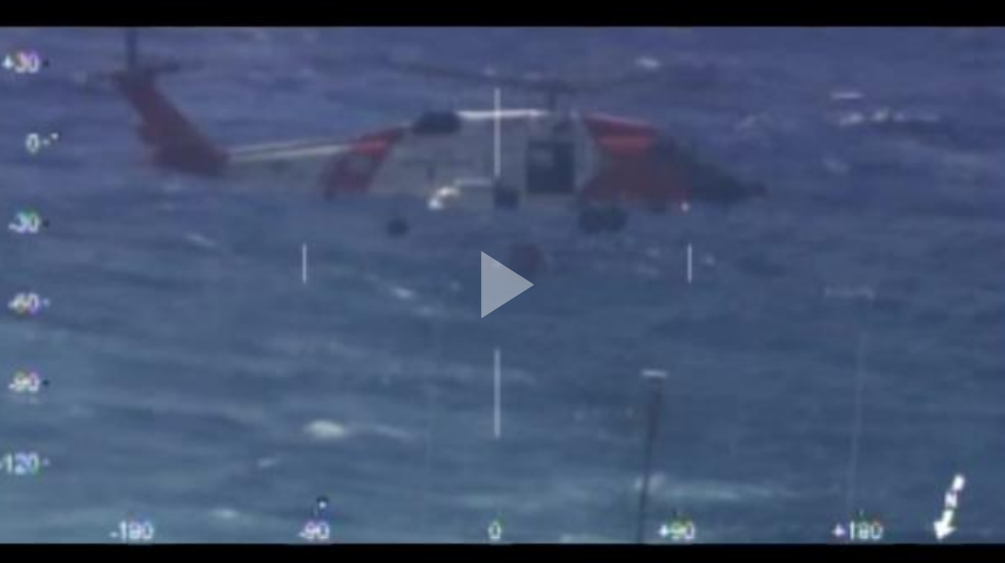 An MH-60 Jayhawk helicopter crew from Coast Guard Air Station Elizabeth City, North Carolina, medevacs an ailing 60-year-old man from a 192-foot U.S. Navy offshore supply ship 160 miles off Cape Hatteras, North Carolina, July 22, 2017. The ship’s master reported that the crew member had been found unconscious, was revived with an automated external defibrillator and had a weak pulse. (U.S. Coast Guard video by Air Station Elizabeth City/Released)