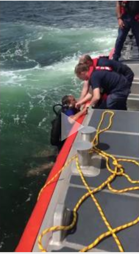 A 45-foot Response Boat-Medium boatcrew from Coast Guard Station Cortez, Florida, rescues a diver, Patrick L. Morgan, 10 miles west of Blackburn Bay, 