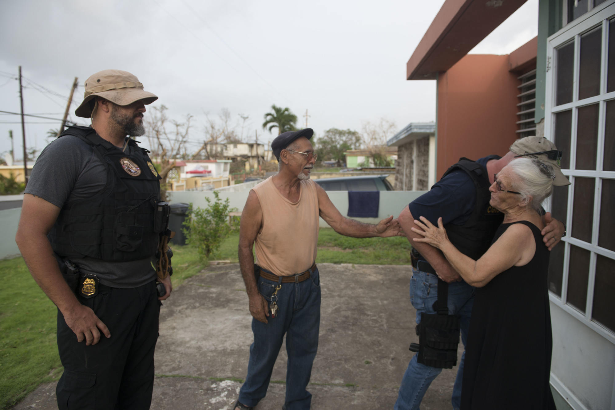 Coast Guard Investigative Service agents provide aid to Puerto Rican residents