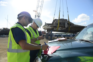 Photo Release: Hurricane Maria response crews transfer wrecked vessels for disposal in Fajardo, Puerto Rico