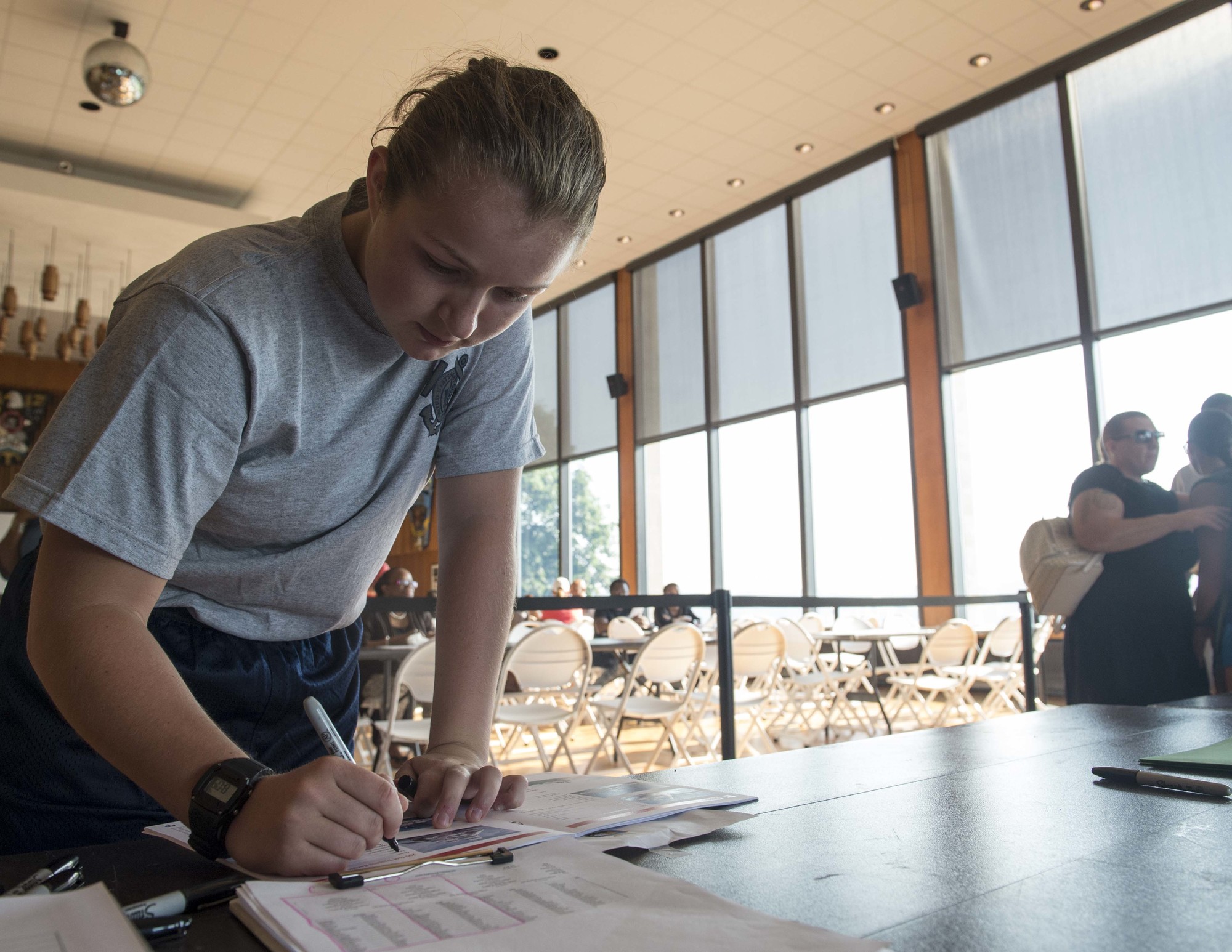 Coast Guard Academy Scholar Lauren Daugherty, of Calvert County, Md., checks in for her 3-week orientation program before departing to Georgia Military College, July 16, 2018. 