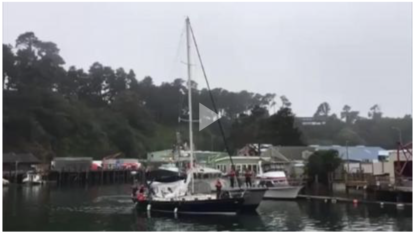A Coast Guard boat crew from Station Noyo River in Fort Bragg, Calif., tows an unmanned sailing vessel to the B Dock in Fort Bragg, July 23, 2018. 