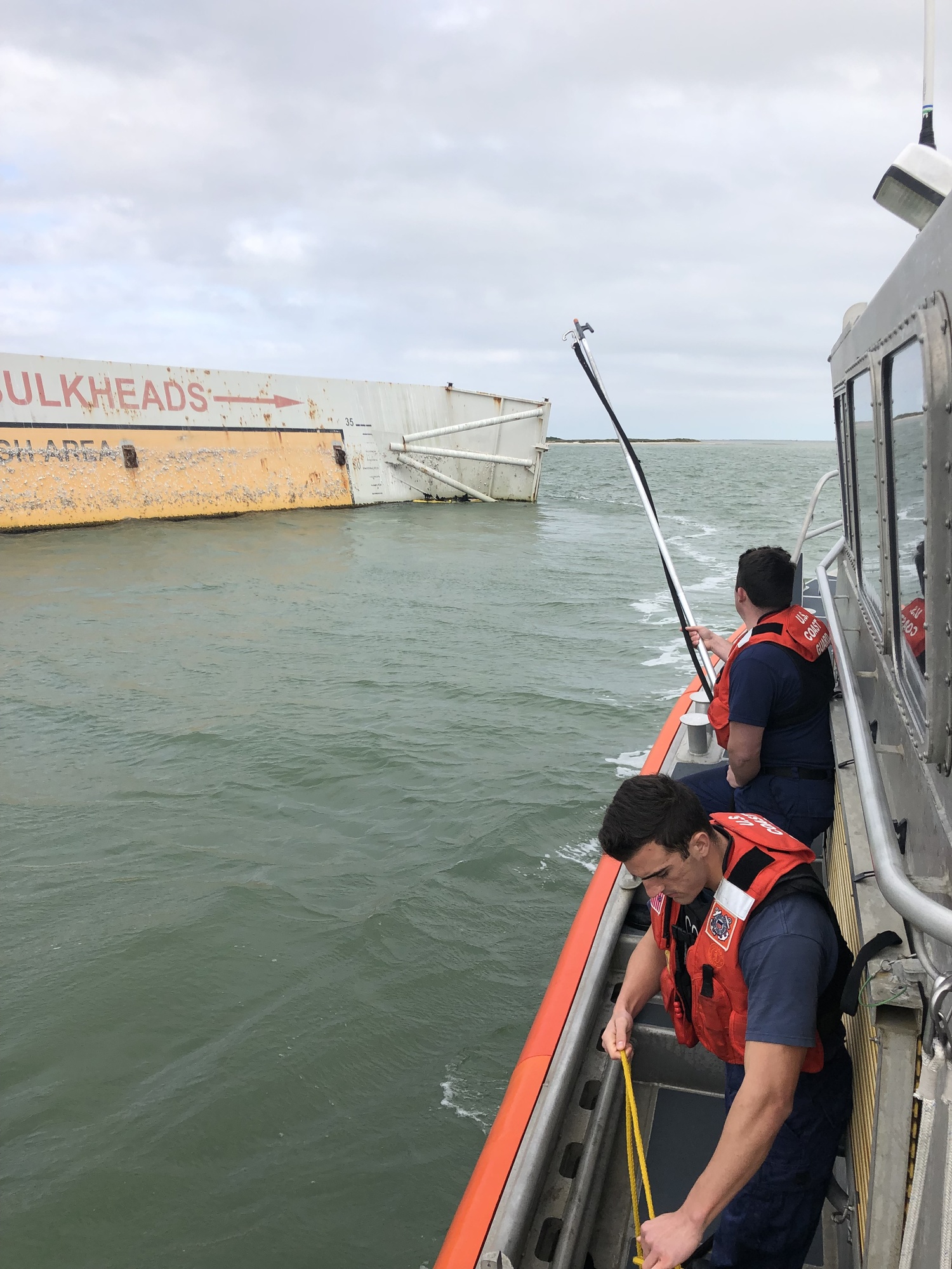 Coast Guard rescues 2 fisherman from capsized kayak