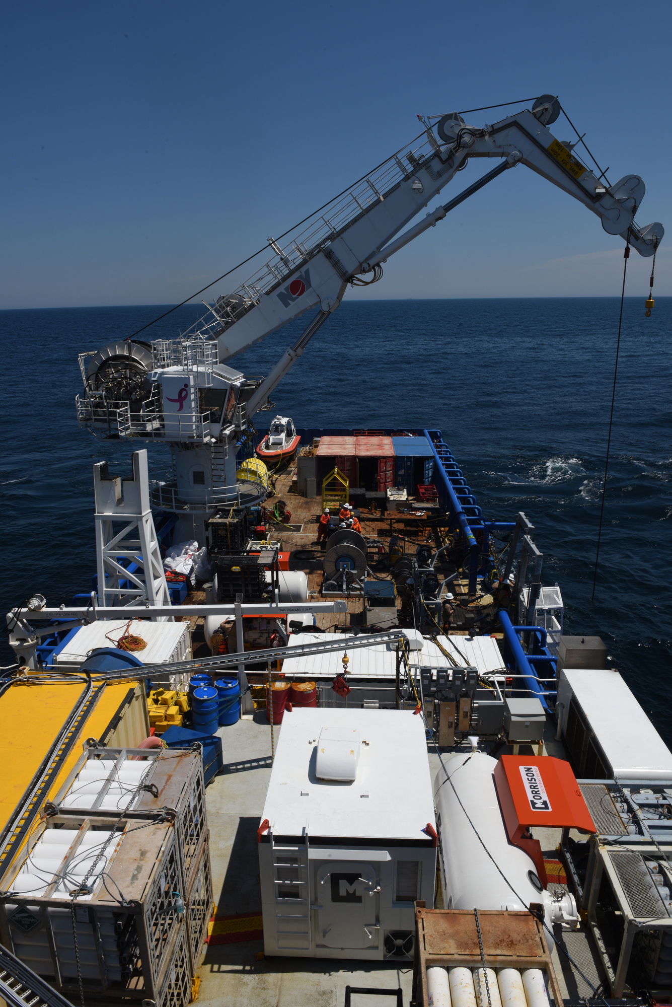 ATLANTIC OCEAN – The deck of the Shelia Bordelon is set for daily operations as divers and a remotely operated vehicle (ROV) prepared to work 180 feet below the surface on the tanker Coimbra wreck, May 16, 2019. The U.S. Coast Guard has contracted the Shelia Bordelon and Resolve Marine Group to conduct a full assessment of oil remaining on the Coimbra wreck, located approximately 30 miles southeast of Shinnecock, N.Y. If substantial oil still remains, and if feasible, the Coast Guard will work with Resolve Marine Group to remove oil from the wreck in order to reduce pollution risks to the environment. The Coimbra, a British-flagged supply ship, sunk off the coast of Long Island in January 1942 when a German U-boat torpedoed it. (U.S. Coast Guard photo by Chief Warrant Officer Allyson E.T. Conroy)