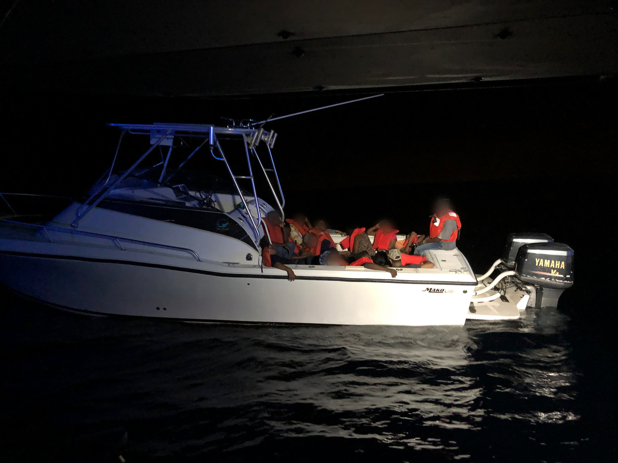 Coast Guard interdicts 14 Haitian migrants and 2 suspected smugglers 12 miles east of Boynton Beach