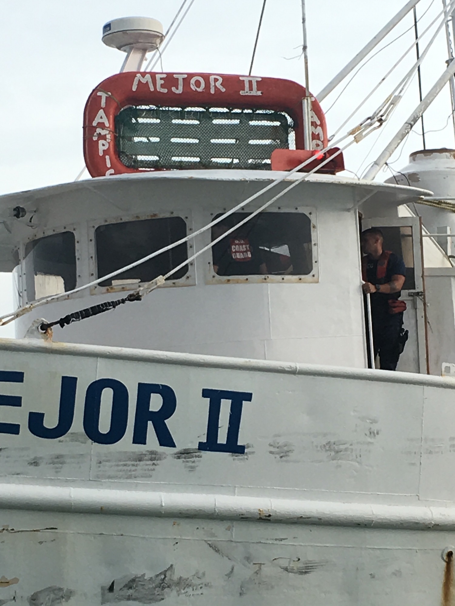 Mexican fishing vessels seek safe harbor ahead of Tropical Storm Ferdinand near Brownsville, Texas