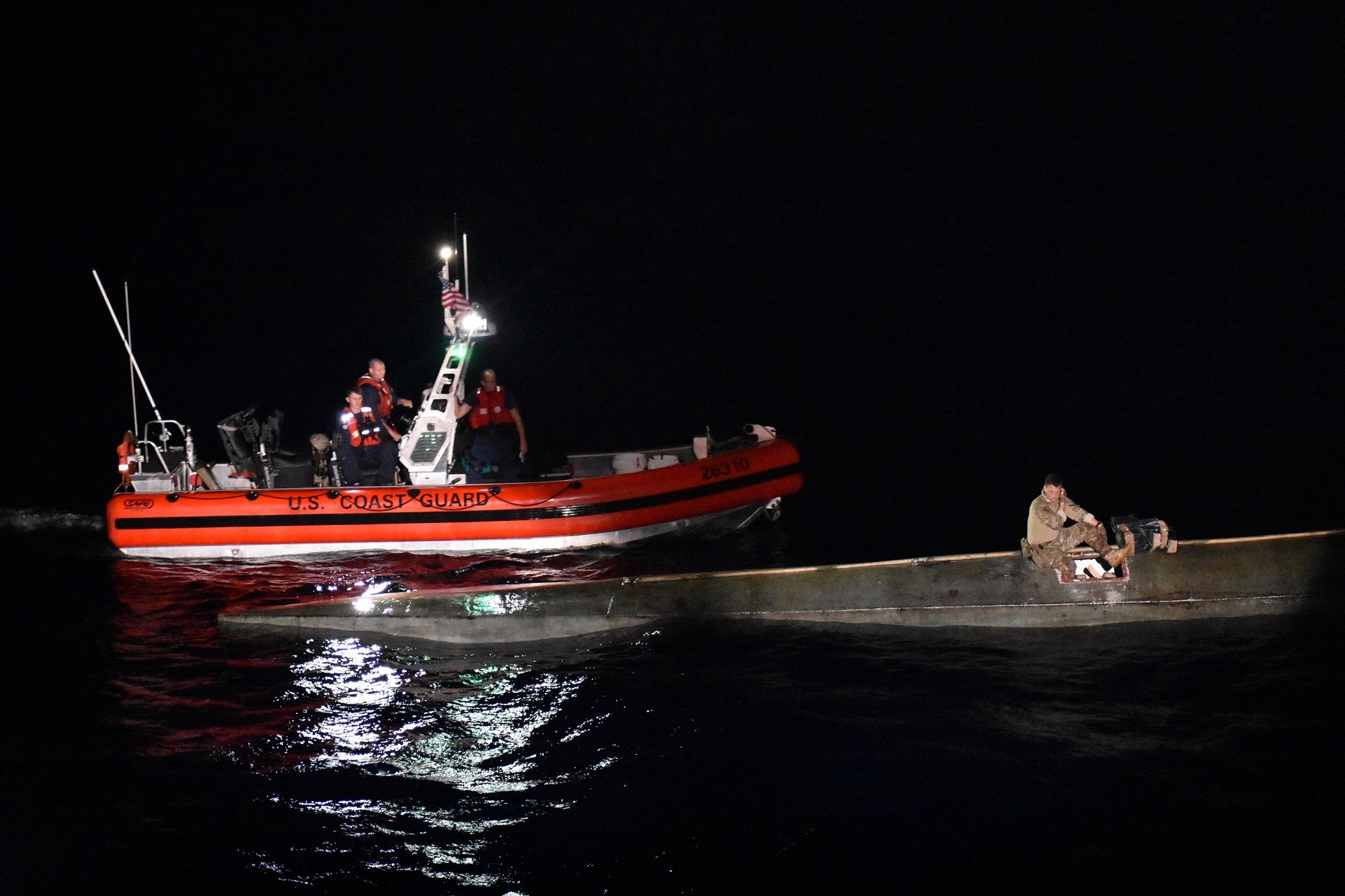 Coast Guard Cutter Vigilant boarding team intercepts a suspected low profile vessel