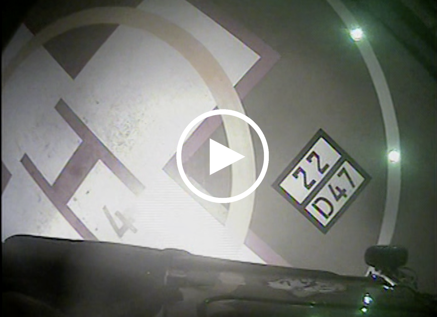 A Coast Guard MH-65 Dolphin helicopter crew from Air Station Houston hoists an injured 17-year-old hunter from the woods in Crosby, Texas, March 2, 2022. The male fell approximately 20 feet from a hunting stand and injured his back. (U.S. Coast Guard video, courtesy Air Station Houston)