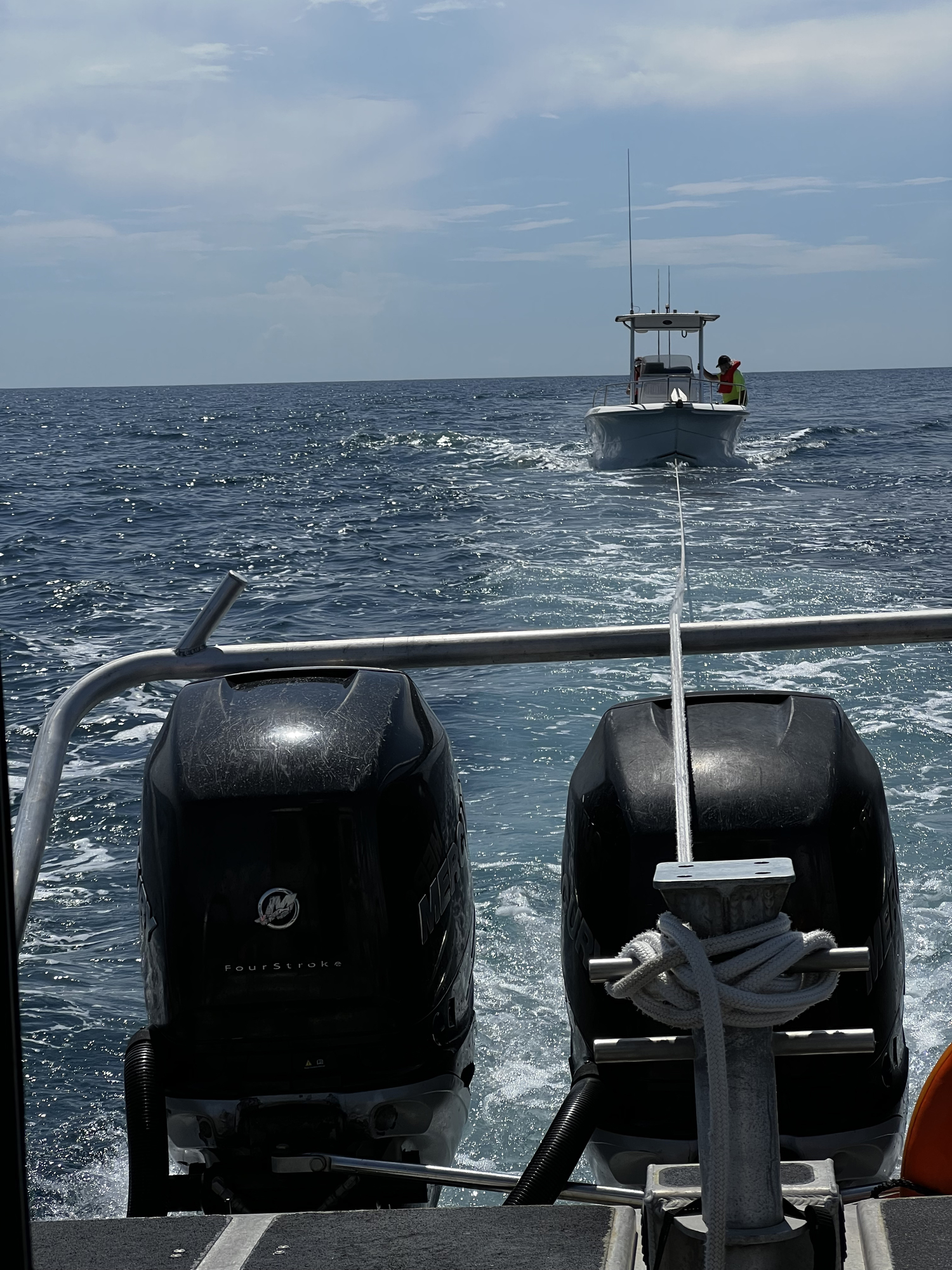 A Coast Guard Station South Padre Island 33-foot Special Purpose Craft–Law Enforcement crew tows a disabled 23-foot center console 5 miles off Port Mansfield, Texas, Aug. 12, 2022. After losing communications with the vessel, Coast Guard Sector Corpus Christi watchstanders issued an urgent marine information broadcast and coordinated the SPC–LE crew's tow of the vessel to Port Mansfield. (U.S. Coast Guard photo, courtesy Station South Padre Island)