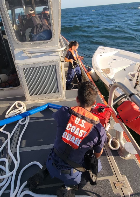 Coast Guard Station assist vessel taking on water near Casey Key
