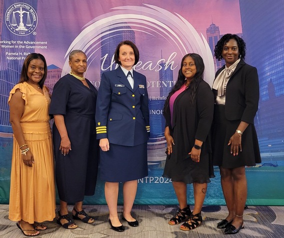 CDR Gretel Kinney and Gail Jackson pose with other members of FEW