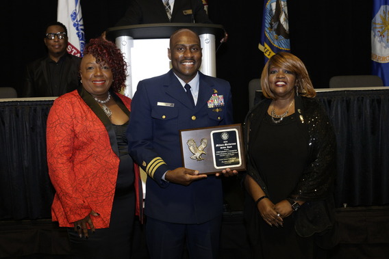 CDR Roberto Concepcion poses with the BIG Military Meritorious Service Award