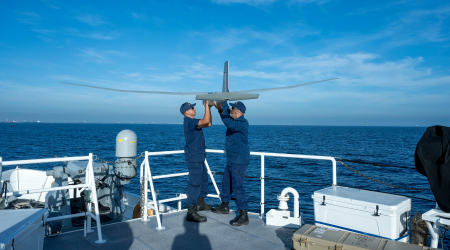 Coast Guard members on a vessel
