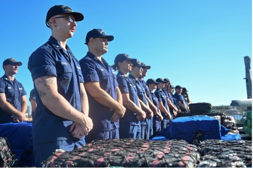 Coast Guard members with interdicted materials