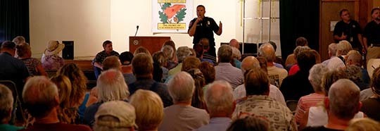 firefighter addressing a meeting