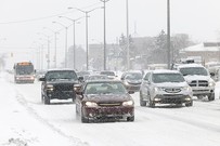 Cars driving on a snowy road