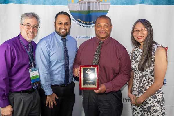 Left to Right: Michael Nowlan, Jose Lara, Preston Wilson, and Eileen Takata receive their FMA Award