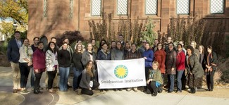 Graduates of the first HEART program pose with teachers and SCRI staff in front of the Smithsonian Castle. (Michael Barnes, Smithsonian)