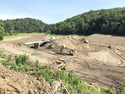 Submitted photo A crew works to lower the Wellsville Reservoir Dam. The village had to ensure a safe breach, a project required by the state. 