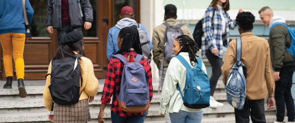 Image of students walking into school