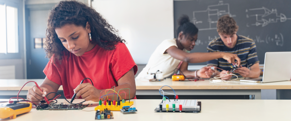 Student works at desk