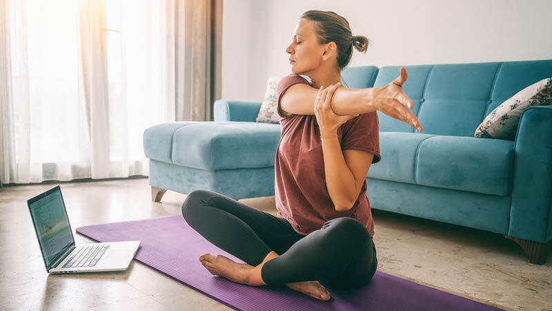 2024 Jan M3 Woman stretching on yoga mat