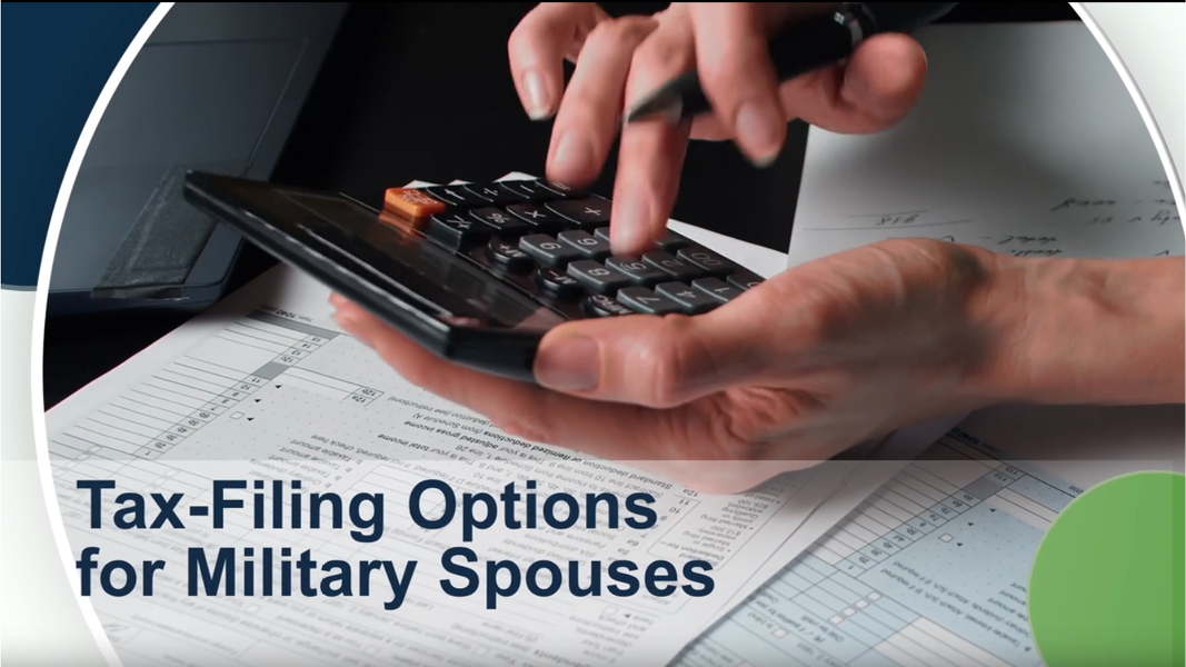 Hands using calculator