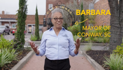 Barbara Blain-Bellamy, Mayor of Conway, South Carolina, gesturing while speaking outside Conway City Hall.